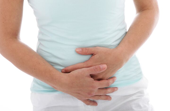 One of the symptoms of cystitis in a woman is a nagging pain in the lower abdomen